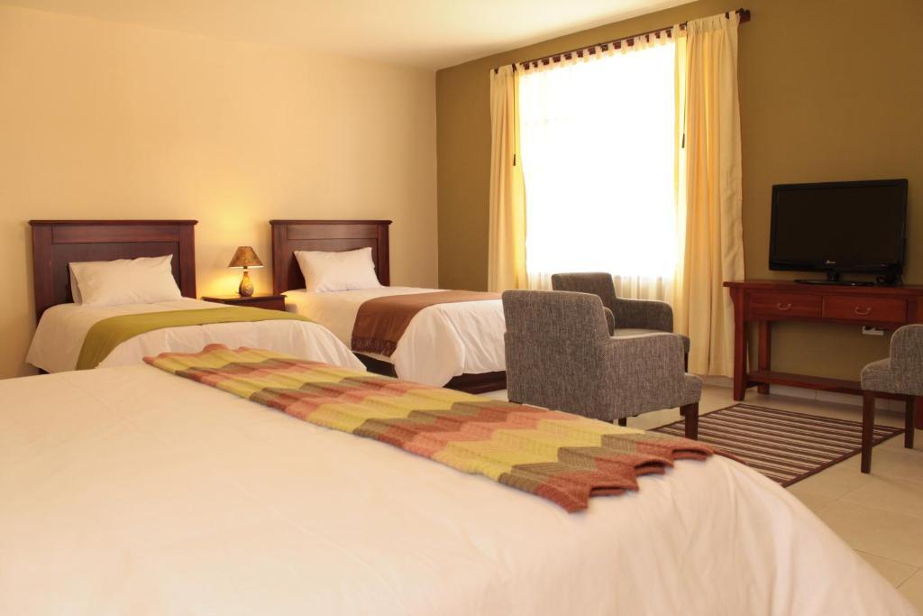 Hotel La Quinta San Andrés à Ibarra Chambre photo